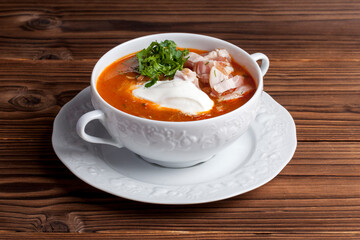 soup with vegetables meat and sour cream