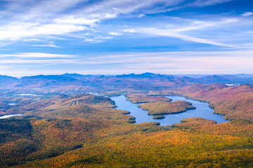 A view of Lake Placid on a sunny autumn day as seen by looking south west from the summit of Whiteface Mountain in Adirondack National Park, Upper New York