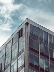 Fototapeta premium Business building with stormy clouds above