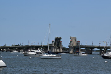 Sailboat on Matanzas Bay, Saint Augustine, Florida. Raised drawbridge in the background.