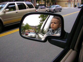 reflection of a boy in the mirror
