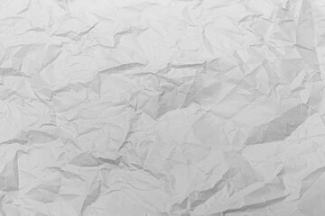 abstract background of crumpled white parchment texture close up
