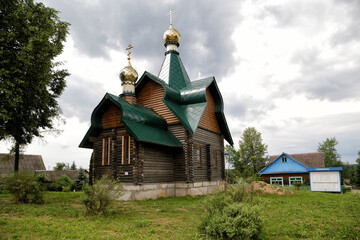 Fototapeta na wymiar Gomel village, Belarus - 07/05/2020: Church of St. George the Victorious in the Gomel village of Polotsk district