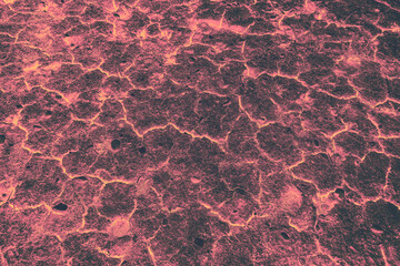 Glowing Lava Rock Texture with strong contrast black and orange tones, depicting drought, chaos and...