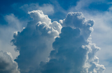 Naklejka na ściany i meble Storm clouds with blue sky background