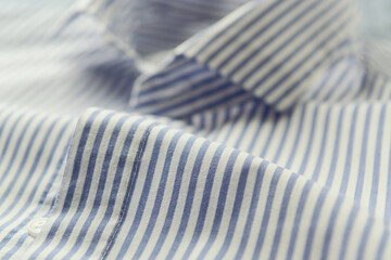  Close up of men's striped shirt.