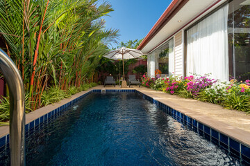 Exterior design of house, home and pool villa feature swimming pool, terrace, landscape garden and sun bed