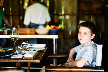 Teenage boy at restaurant