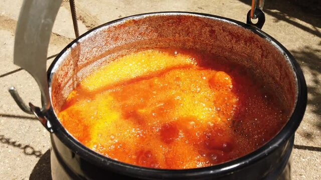 Hungarien fish soup with paprika and onion and fish.