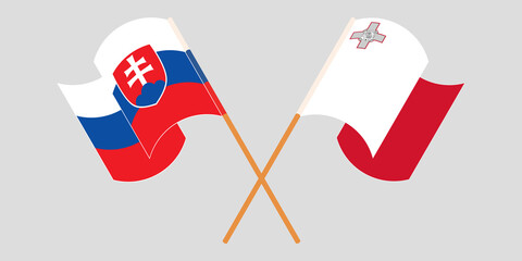 Naklejka premium Crossed and waving flags of Malta and Slovakia