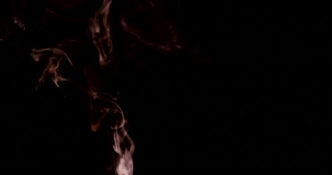 Abstract red flames. Isolated on black background. 4k DCI footage.