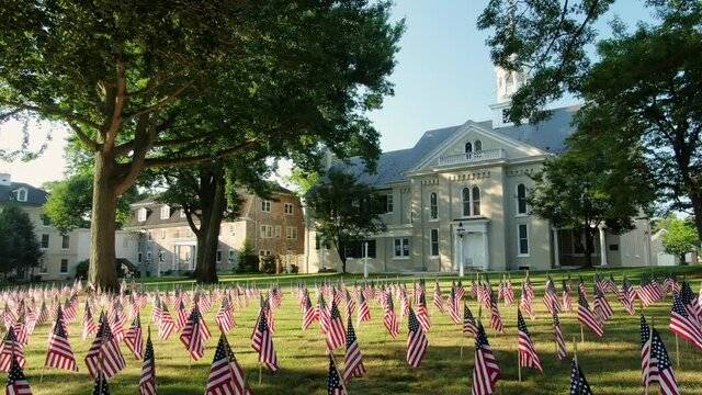 Separation Of Church And State Theme, American Flags Juxtaposed With Historic Church And Steeple In United State Of America