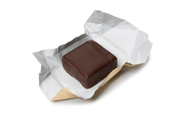 Chocolate candy open from a wrapper isolated on a white background