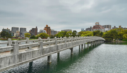 Fototapeta premium Ohori Park is a pleasant city park in central Fukuoka (Japan) with a large pond at its center. The park was constructed between 1926 and 1929. 04-07-2015