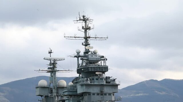 Many antennas, radars and echo sounding systems on a warship