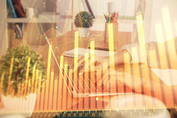 Double exposure of woman hands typing on computer and forex chart hologram drawing. Stock market invest concept.