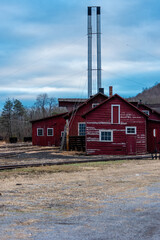 Fototapeta na wymiar Derelict Maintenance Shops + Smokestacks - Abandoned East Broad Top Railroad - Pennsylvania