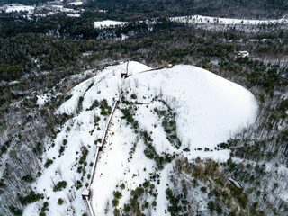 Abandoned Iron Tailings Pile - DJI Mavic Drone Aerial - Snow Covered Adirondack Mountains of New York