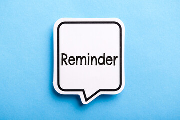 Reminder Speech Bubble Isolated On Blue Background