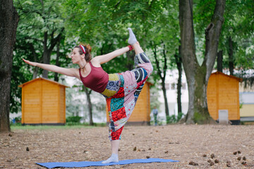 Obraz premium young woman doing yoga exercise