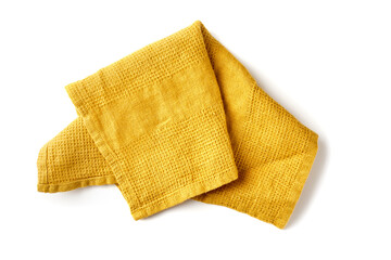 Crumpled yellow textile napkin on white