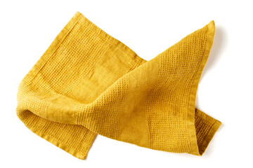 Crumpled yellow fabric napkin on white