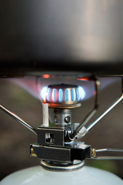 Butane stove flame with pot on top