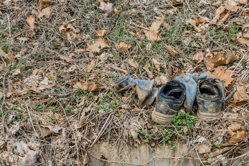 Muddy athletic shoes and socks