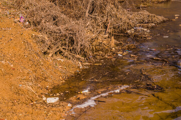 Washed up pollution at the shore