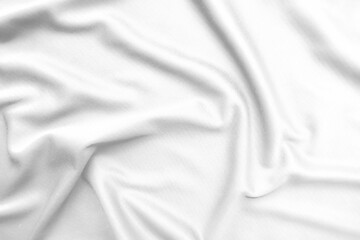 Abstract white fabric texture background. Wavy white cloth.