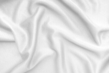 Abstract white fabric texture background. Wavy white cloth.