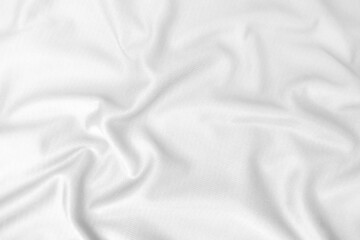 Abstract white fabric texture background. Wavy white cloth.