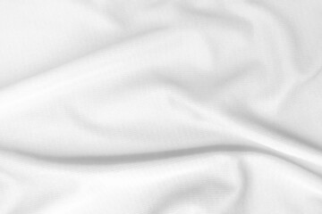 Fototapeta premium Abstract white fabric texture background. Wavy white cloth.