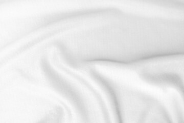 Fototapeta premium Abstract white fabric texture background. Wavy white cloth.