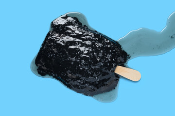 top view chocolate flavor popsicle shredded coconut melted on blue background