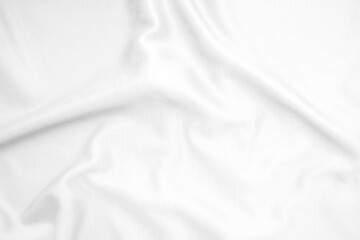 Abstract white fabric texture background. Wavy white cloth.