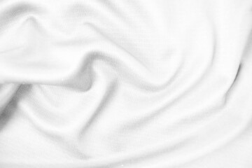 Abstract white fabric texture background. Wavy white cloth.