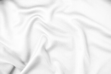Naklejka premium Abstract white fabric texture background. Wavy white cloth.