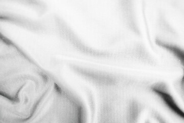 Abstract white fabric texture background. Wavy white cloth.