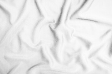 Abstract white fabric texture background. Wavy white cloth.