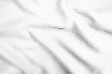 Fototapeta na wymiar Abstract white fabric texture background. Wavy white cloth.