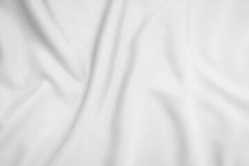 Abstract white fabric texture background. Wavy white cloth.