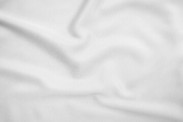 Abstract white fabric texture background. Wavy white cloth.