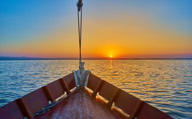 Sunset on the Albufera Canal boats in El Palmar in Valencia Spain
