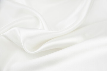 Obraz premium White satin fabric with gentle curves