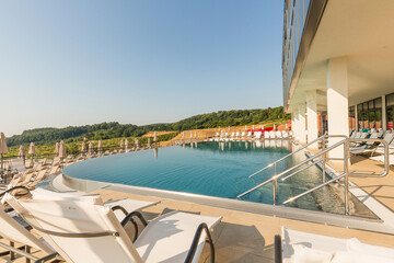 Fototapeta premium Outdoor swimming pool in a modern hotel