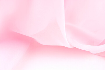 Pink satin fabric with delicate curves