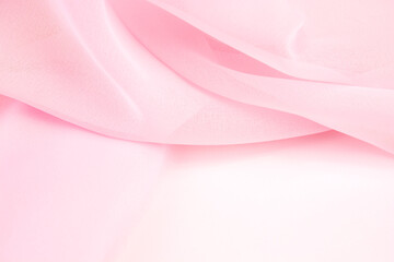 Pink satin fabric with delicate curves