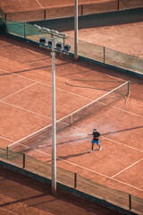tennis court in the park, maintenance or cleaning