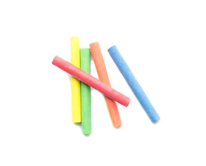 chalks in a variety of colors arranged on a white background